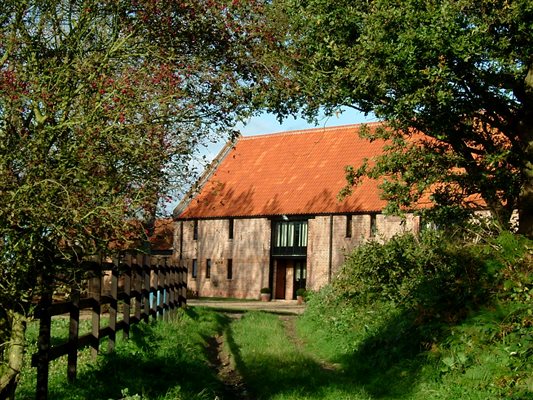 brick cottage with tile roof